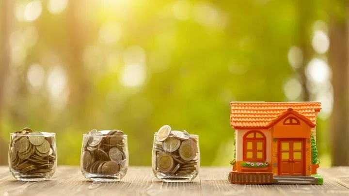 coin clear jar piggy bank home model green nature blur background money savings home concept 30478 5380